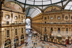 Elevated view of Galleria Vittorio Emanuele II in Milan on May 2, 2012. Built in 1875 this gallery is one of the most popular landmarks in Milan. The picture, taken from a hardly accessible balcony, offers a unique view of the gallery from above